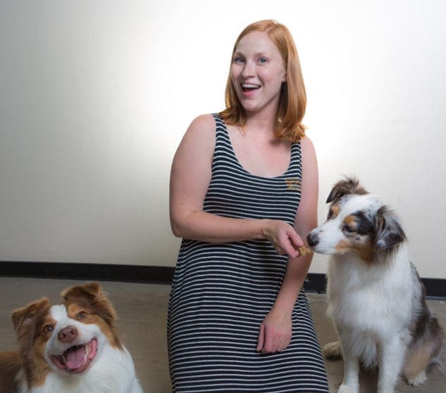 woman and two dogs