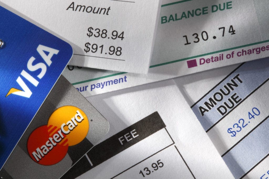 credit cards and paper invoices