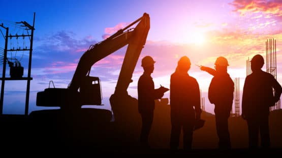 construction site scene at sunset