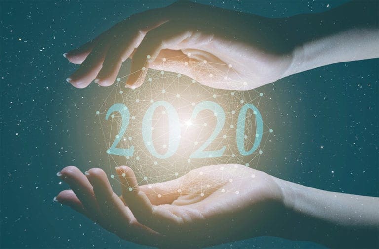 hands holding the number 2020, used to communicate technology trends for 2020