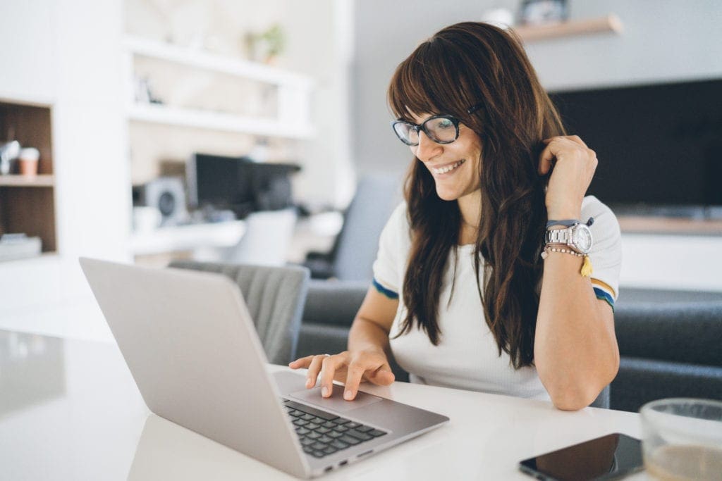 Young woman in her home office
