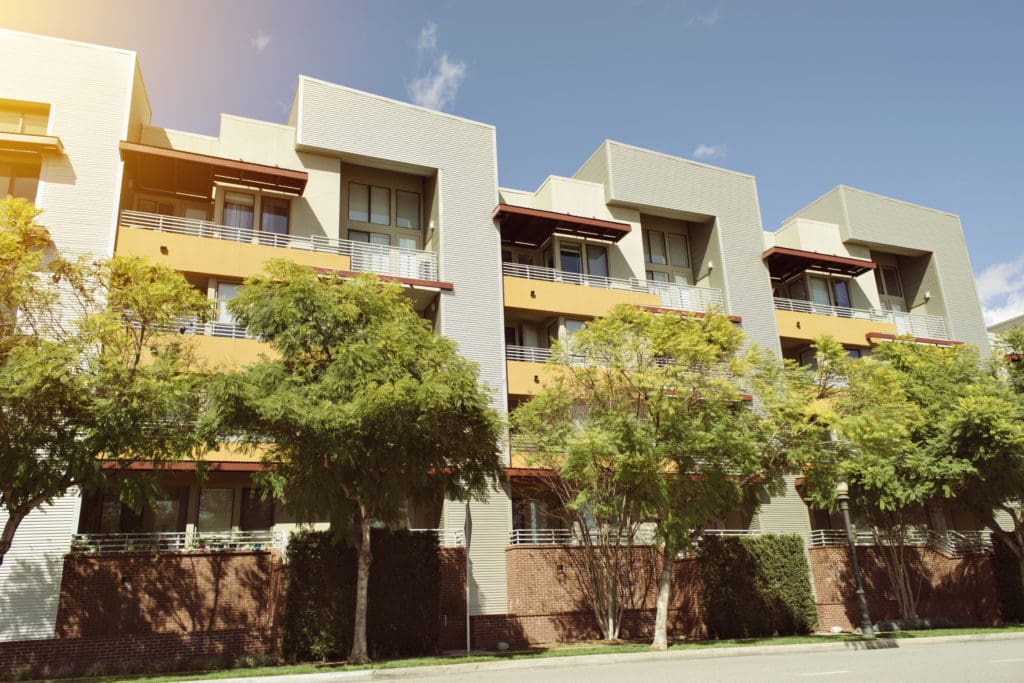 View of modern apartment building on a sunny day