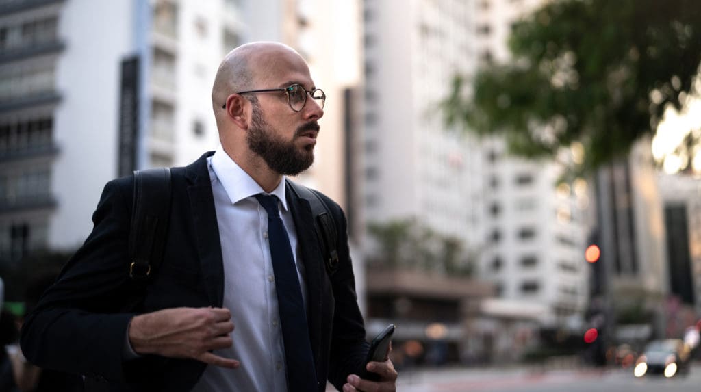 Businessman walking in the city