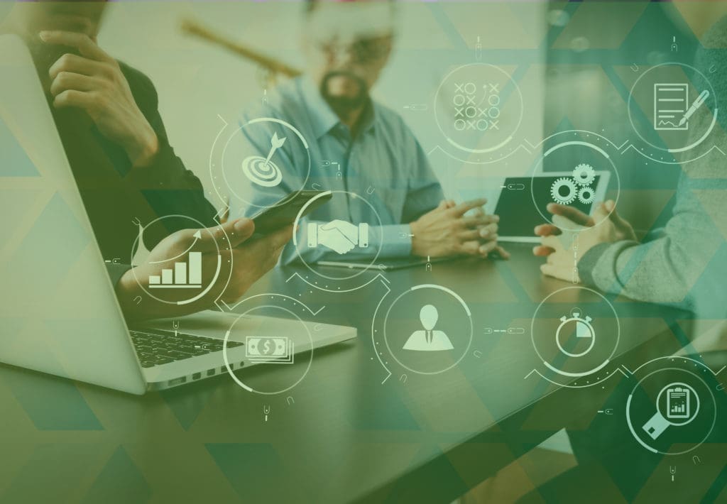 Co-working team meeting concept,businessman using smart phone and digital tablet and laptop computer in modern office