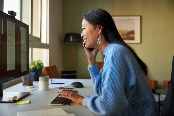 Businesswoman reviewing an electronic invoice