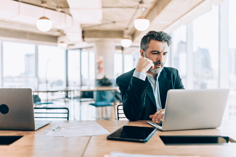 man working on laptop