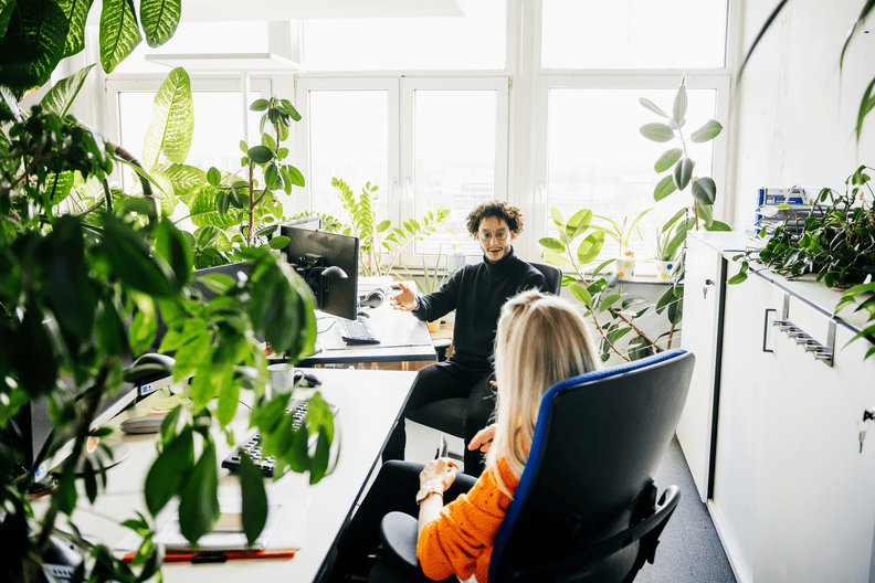 man sitting at desk at work