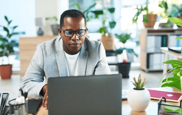 man working on laptop