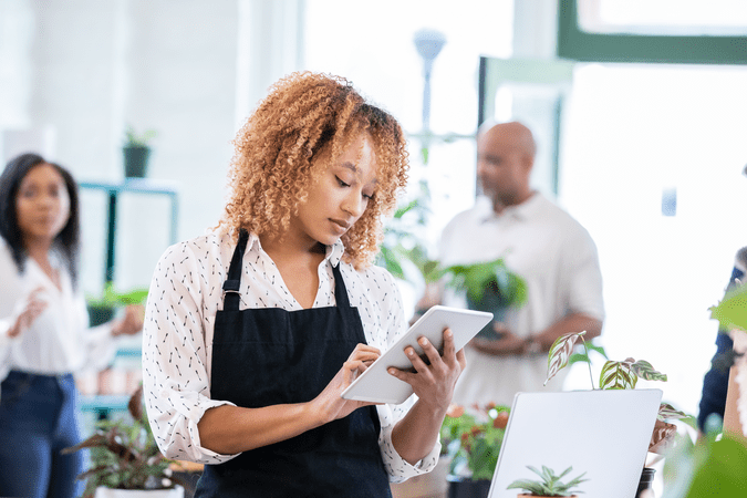 lady working in plant store