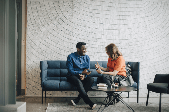 people talking on a couch