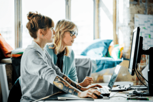 women working at computer