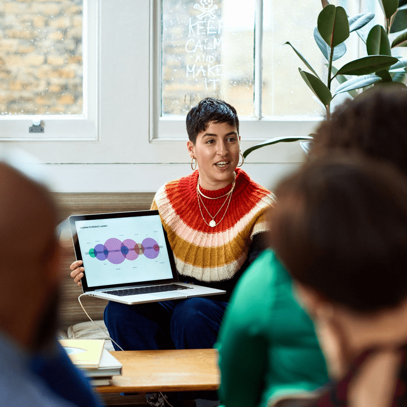 person presenting on laptop