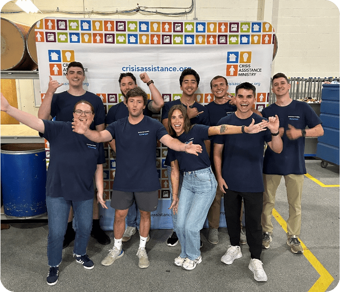 A group of AvidXchange employees volunteering.