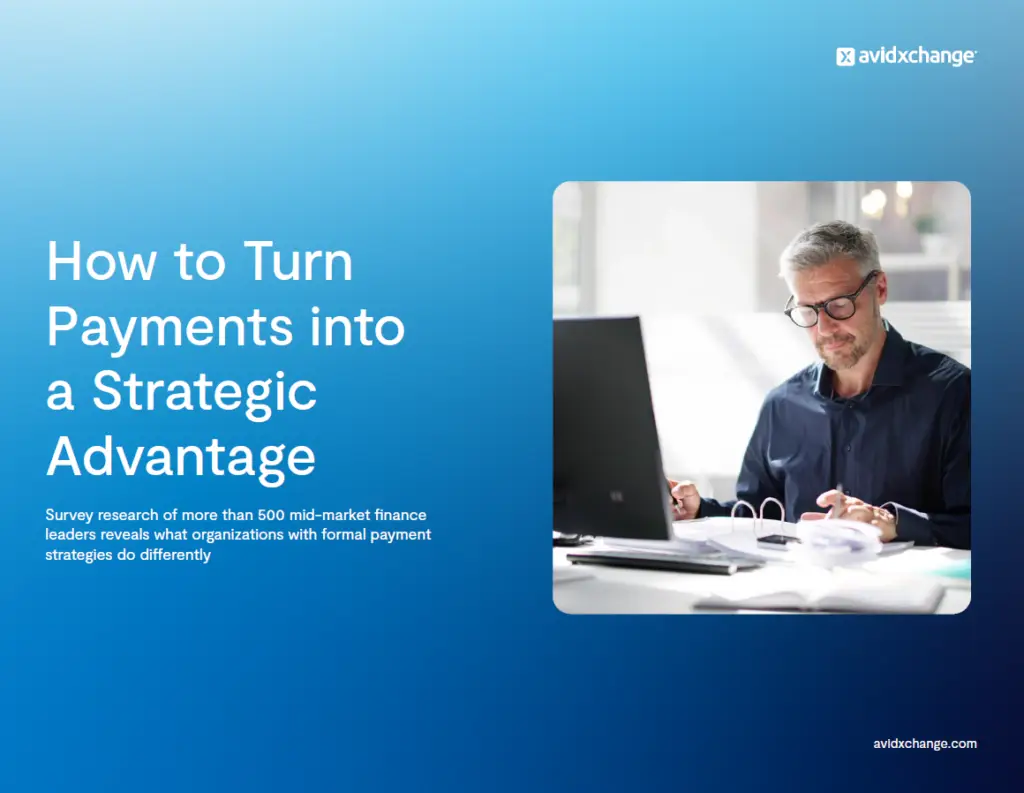 Thumbnail image of B2B payment strategy eBook featuring a man working at a computer